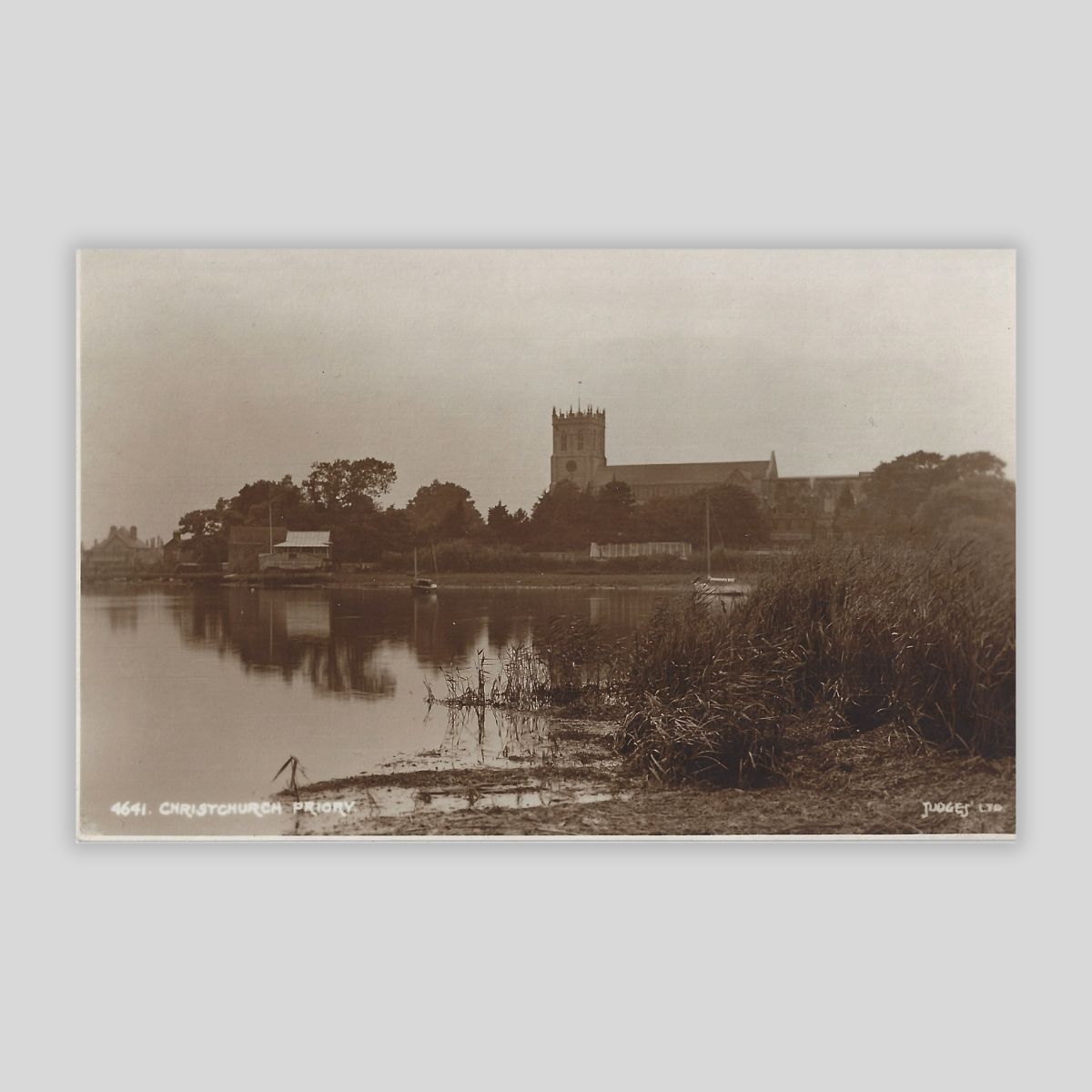 Christchurch Priory – Riverside View (c.1920s Real Photo Postcard | Judges Ltd., Hastings | No. 4641)