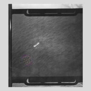 RAF Reconnaissance Photograph – Small Coastal Vessel at Sea (WWII Aerial Intel)