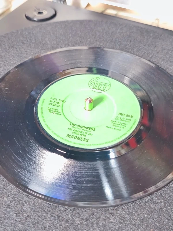 Madness Baggy Trousers The Business 7” vinyl green label close up